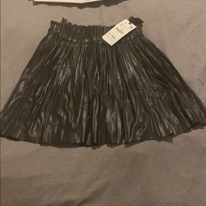 Brand new faux leather pleated mini skirt